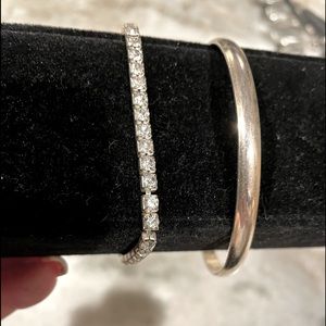 Stretchable crystal bracelet with silver bangle. Sold as a set.